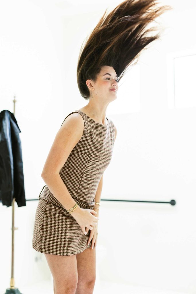 Woman shows wild hair-do at chandler salon Bronde Blvd Salon